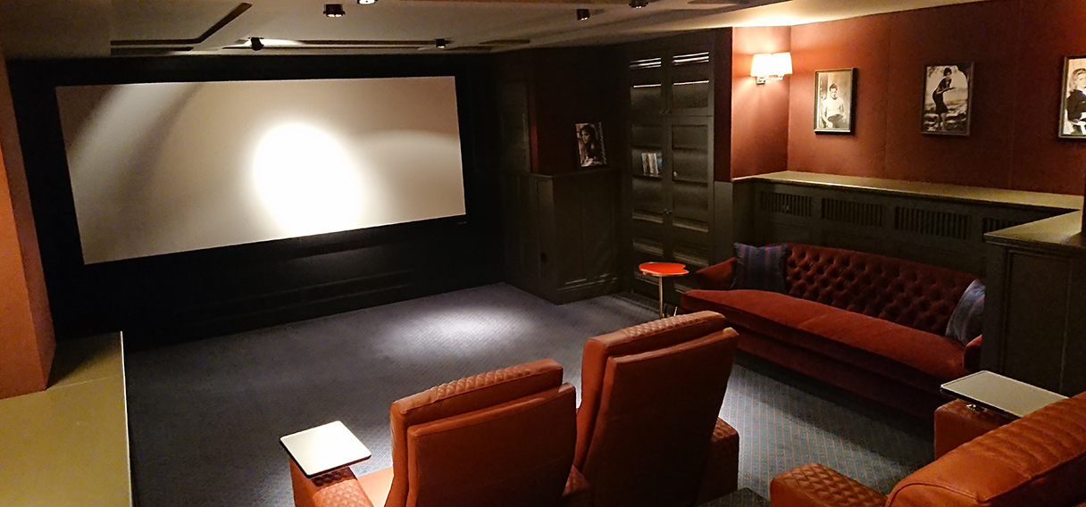 Home cinema in a dedicated area of a residential building in Deauville village, Moscow