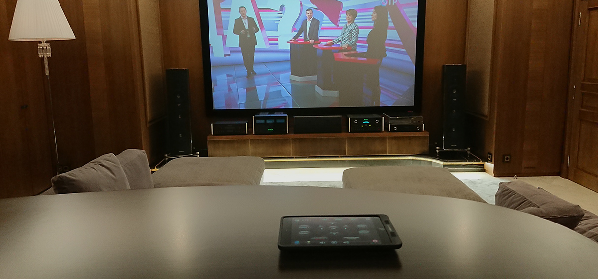 Home cinema is in a dedicated area of a residential building in Deauvillevillage, Moscow city.